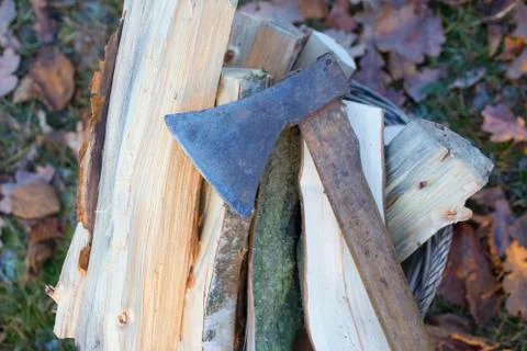 Axe and logs Stock Photos