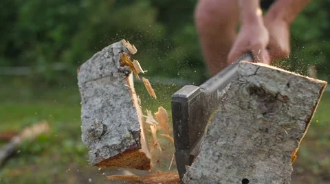 Axe breaks a log Stock Footage 54896292