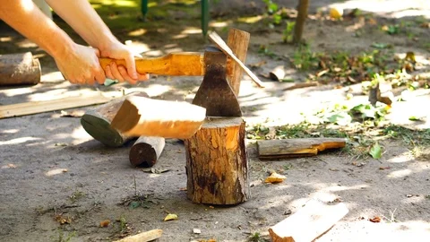 Axe cuts wood Stock Footage 94831302