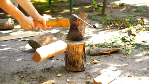 Axe cuts wood Stock Footage 94831310