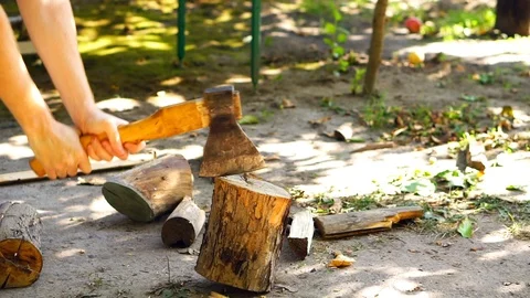 Axe cuts wood Stock Footage 94831316