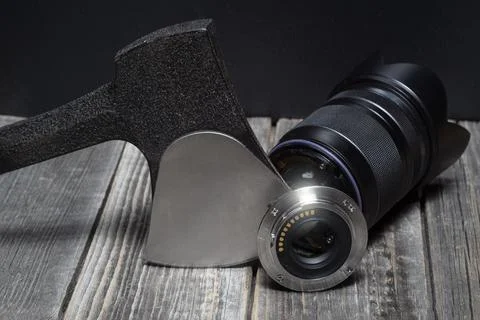 Axe destroy camera lens Stock Photos