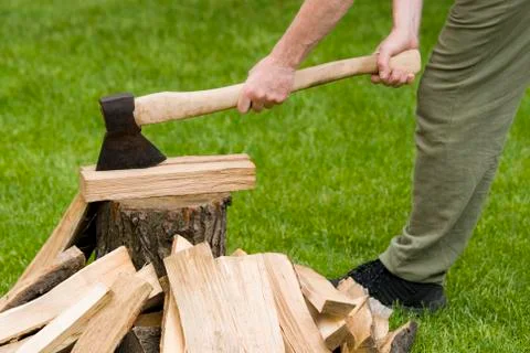 Axe with firewood Stock Photos