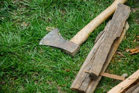Axe On The Grass Stock Photos
