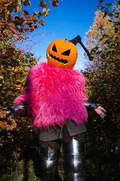 Axe in pumpkin Stock Photos