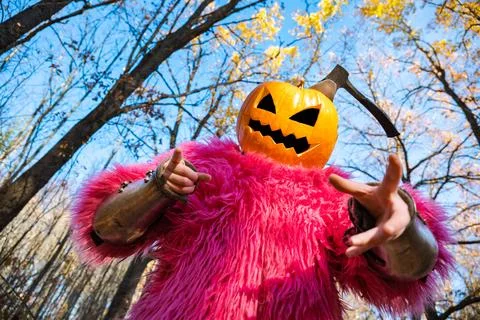 Axe in pumpkin Stock Photos