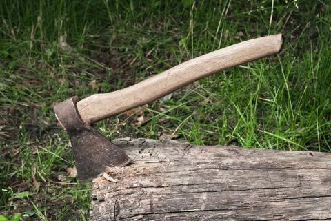 Axe sticked in the beam Stock Photos