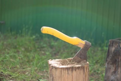 Axe in stump Stock Photos