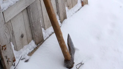 Axe In Winter Stock Footage 87699371