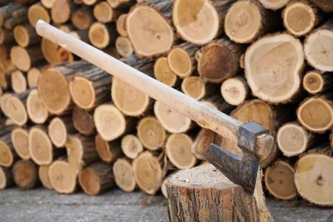 Axe in wood Stock Photos