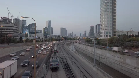 Ayalon evening traffic and train north Stock Footage 117137336