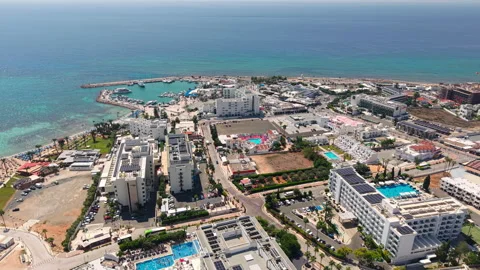 Ayia Napa, Cyprus. Drone View of Summer Resort Buildings, Marina and Stock Footage 346877570