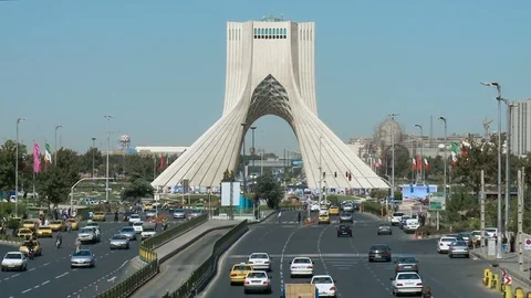 The Azadi Tower with car traffic in Tehran, Iran Stock Footage 119777429
