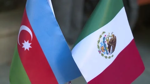 Azerbaijan and Mexico flags on the table Stock Footage 239329515