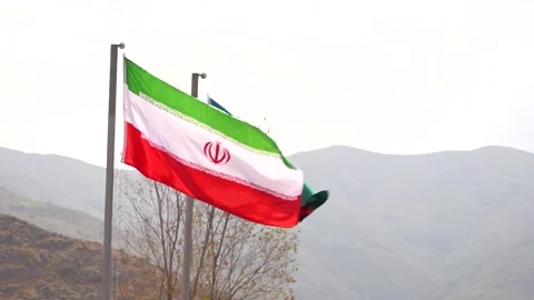 Azerbaijan - Iran Border, State Flags waving in the windy weather Stock Footage 216775147