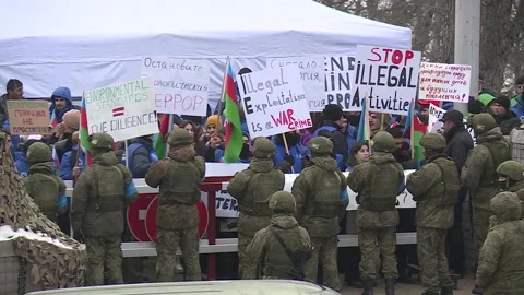 Azerbaijani eco-activists protesting illegal exploitation Khankandi-Shusha road Vídeos de archivo 228256741