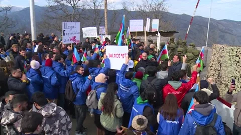 Azerbaijani eco-activists protesting illegal exploitation Khankandi-Shusha road Stock Footage 228257080