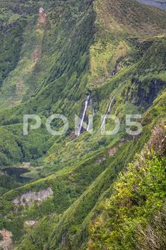 Azores landscape with waterfalls and cliffs in Flores island. Portugal. Stock Photos