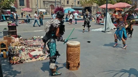 Aztec dancers performing ritual with drum at Zócalo square, Mexico City Stock Footage 319054993