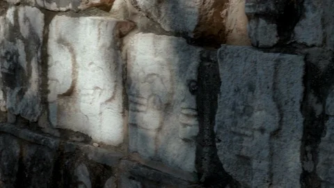 Aztec rock brick wall with beautiful ancient carvings, Side dolly shot Stock Footage 118093817