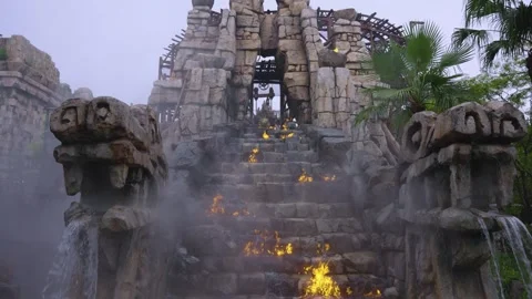 Aztec Style Theme Park Attraction, Flames and Steam Rise from Temple in Slow Stock Footage 342339278