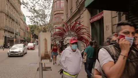Aztec Warrior Character Walking Down the Streets in Mexico City Stock Footage 150438567