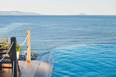 Azul infinity pool on the sunset Empty azul infinity pool on the sunset, q... Stock Photos