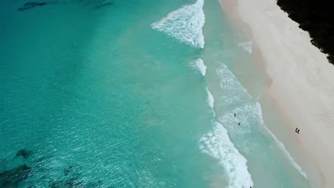 Azure beach with big waves from a height Stock Footage 167705424