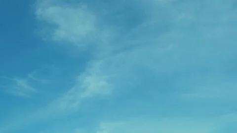 Azure Blue Clear Sky with Light Clouds in Sunny Weather, Time Lapse, Slow Motion Stock Footage 196082517