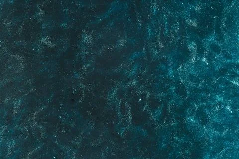 Azure blue paint diffusing with water Stock Illustration
