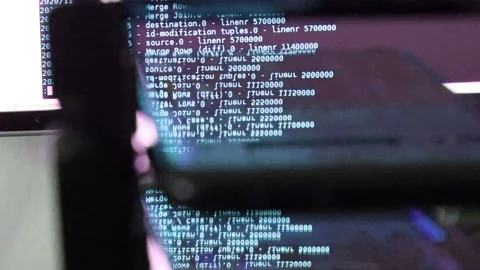 Azure computer software code moving on a black monitor reflect on glass. Abst 스톡 동영상 143878488