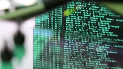 Azure computer software code moving on a black monitor reflect on glass. Abst 스톡 동영상 144048065