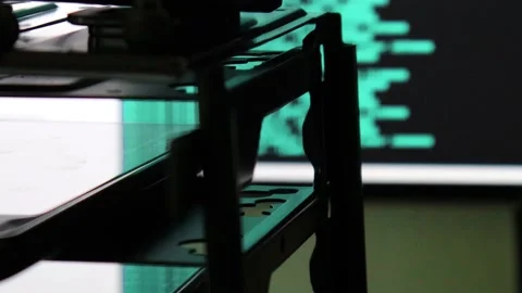 Azure computer software code moving on a black monitor reflect on glass. Abst Stock Footage 144049865