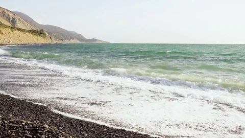 Azure waves beautifully roll ashore Stock Footage 82448816