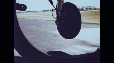 B-17 Flying Fortress landing on runway Stock Footage