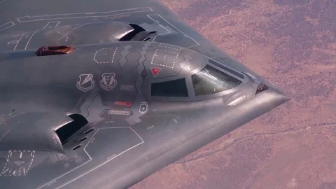 B-2 heavy stealth strategic bomber flies against the background of the earth Video stock 121031406