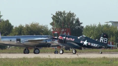 B-25 Mitchell and  carrier-based fighter Chance F4U Corsair is on runway. Stock Footage 115012708