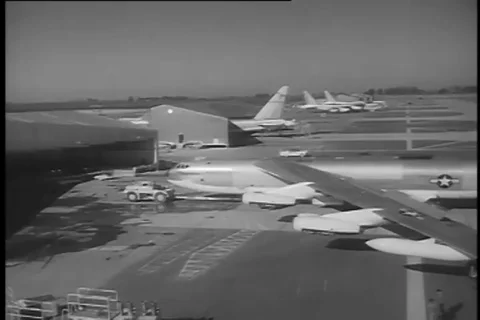 B-52 aircraft positioned and pulled into new constructed dock - 1956 Stock Footage 99085695