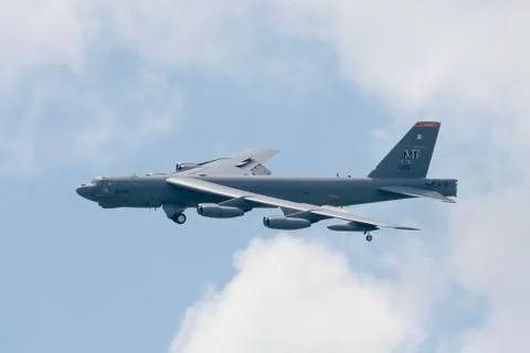 B-52 bomber, left side, partly cloudy Stock Photos