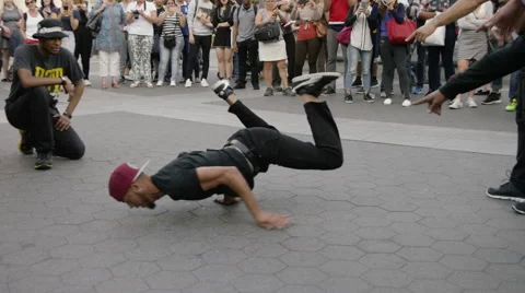 B-boy breakdancing with hat backwards in Washington Square Park in 4K NYC 스톡 동영상 55176850