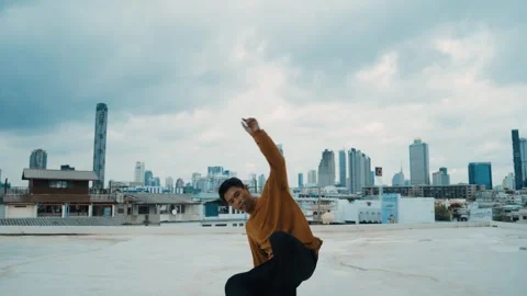 B-boy dance performance by professional street dancer at rooftop. hiphop. Stock Footage 257717487
