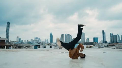 B-boy dance performance by professional street dancer at rooftop. hiphop. Stock Footage 261738928