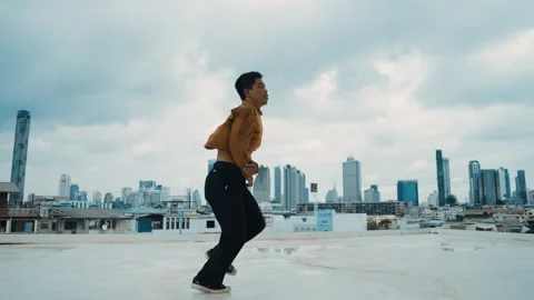 B-boy dance performance by professional street dancer at rooftop. hiphop. Stock Footage 263013094