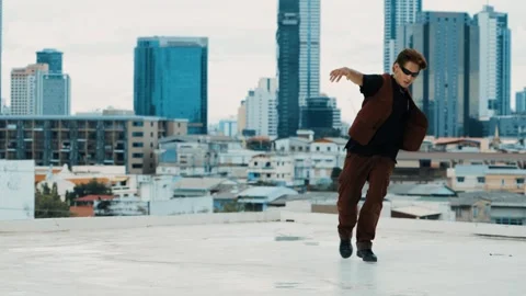 B-boy dance performance by professional street dancer at rooftop. hiphop. Stock Footage 263147165