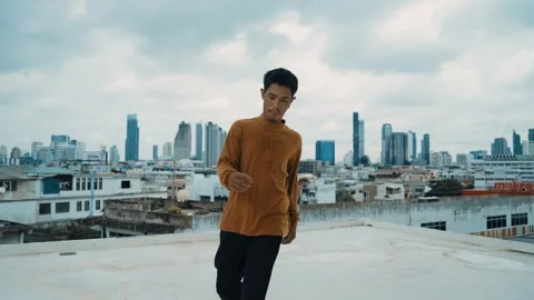 B-boy dance performance by professional street dancer at rooftop. hiphop. Stock Footage 263524513