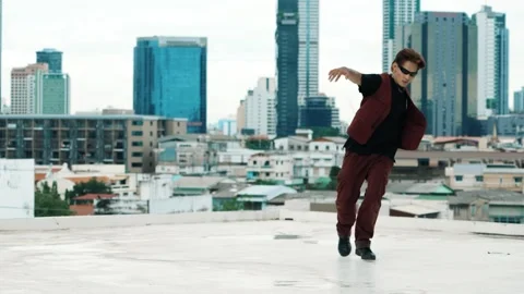 B-boy dance performance by professional street dancer at rooftop. hiphop. Stock Footage 272667747