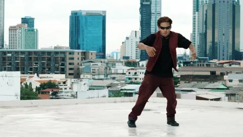 B-boy dance performance by professional street dancer at rooftop. hiphop. 库存影片 275086809