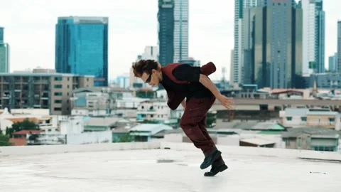 B-boy dance performance by professional street dancer at rooftop. hiphop. Stock Footage 277381063