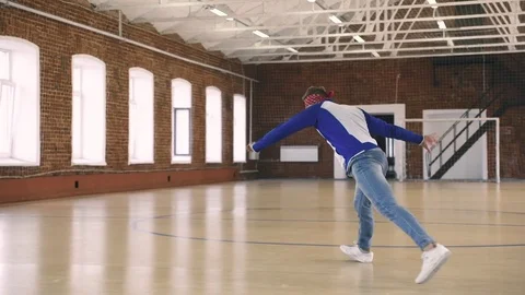 B-boy dancing in sport gym Stock Footage 79237157
