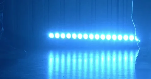 B-boy shows breakdance moves on stage of night club at party Stock Footage 169632014